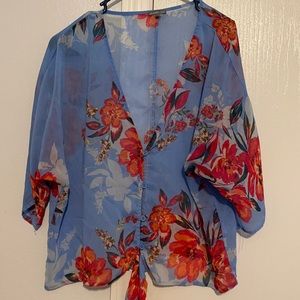 Floral bat wing blouse.